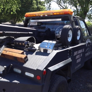 Hook and chain tow truck 